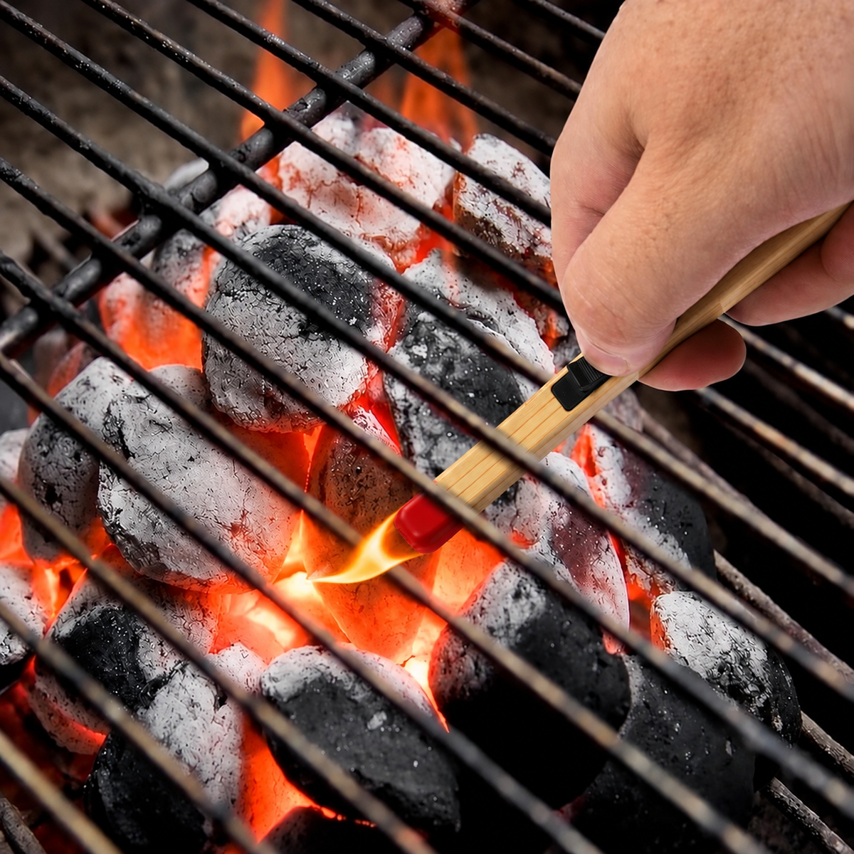 Electric arc lighter being used near a barbecue grill