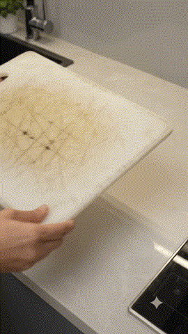 Messy kitchen food preparation before chopping